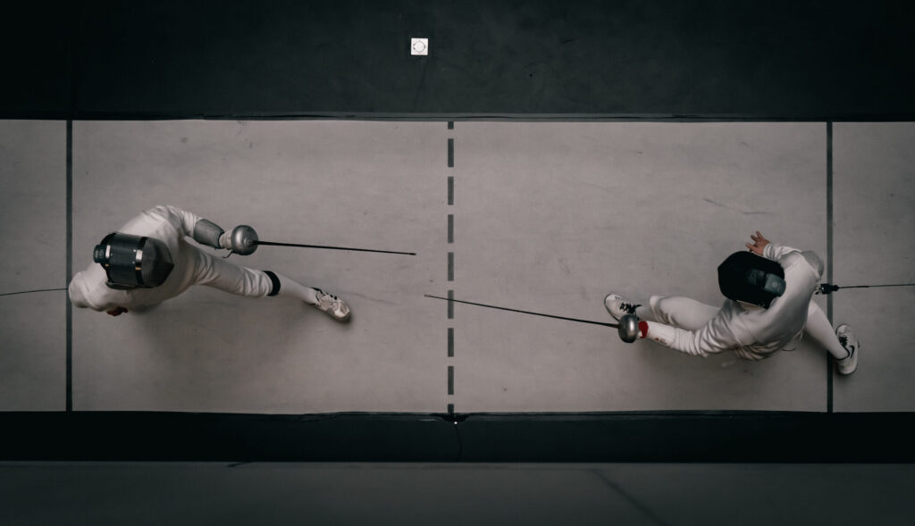 two fencers during a match
